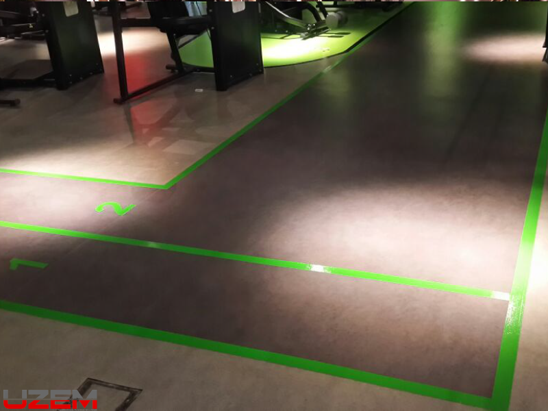 Carousel AVM Gymotion Fitness spor alanı PVC zemin kaplama – yeşil şeritli vinil döşeme uygulaması